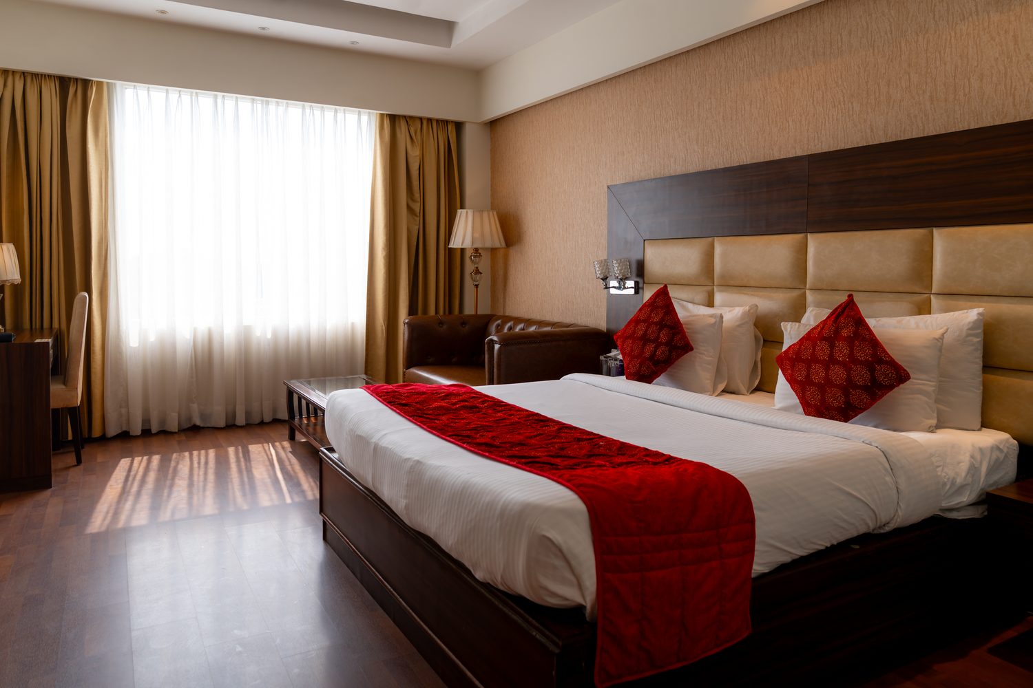 An Executive Room in daylight, the gold curtains drawn back