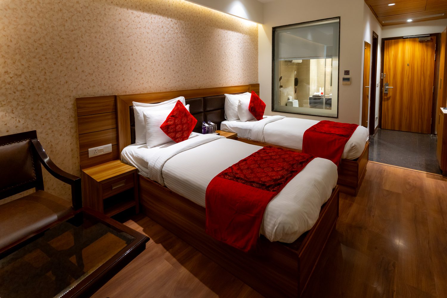 A Twin Room, both beds, the chairs and the mirror